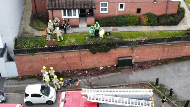 Other image for Two rescued from blazing flats